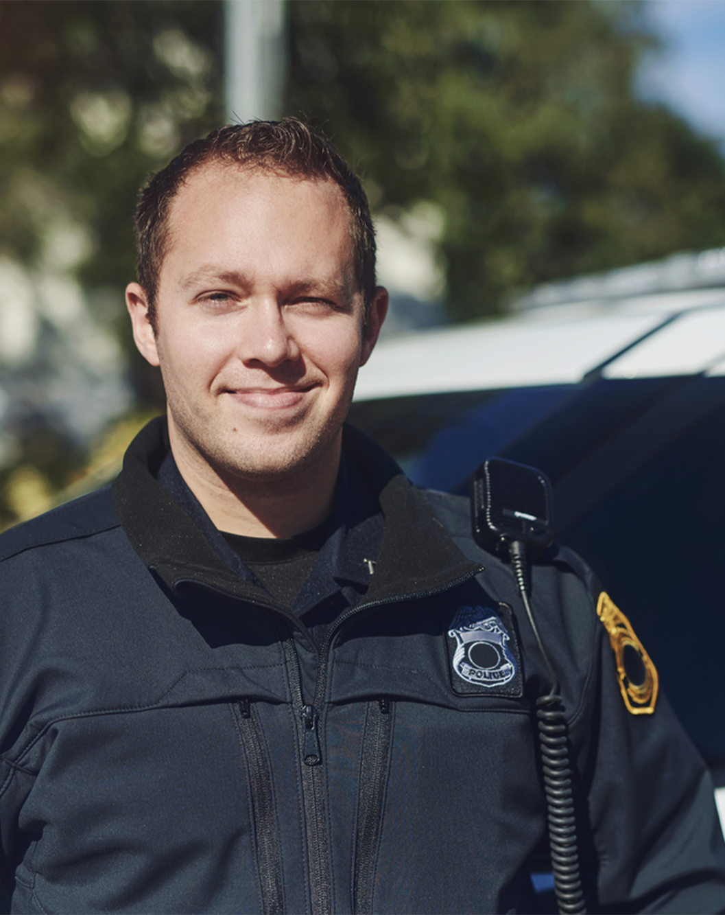 photo of a policeman in uniform using Dragon Law Enforcement